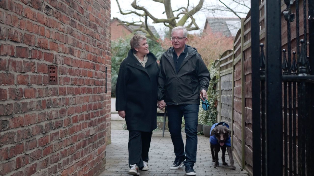 Amanda and Stuart walking dog